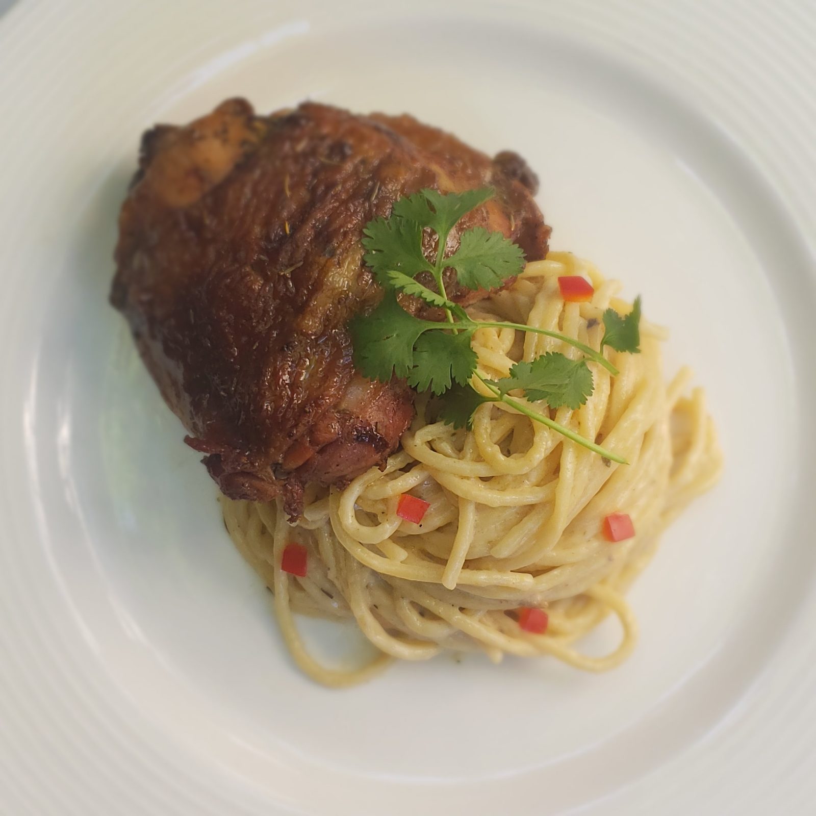 Toyomansi roasted chicken thigh on calamansi cream pasta